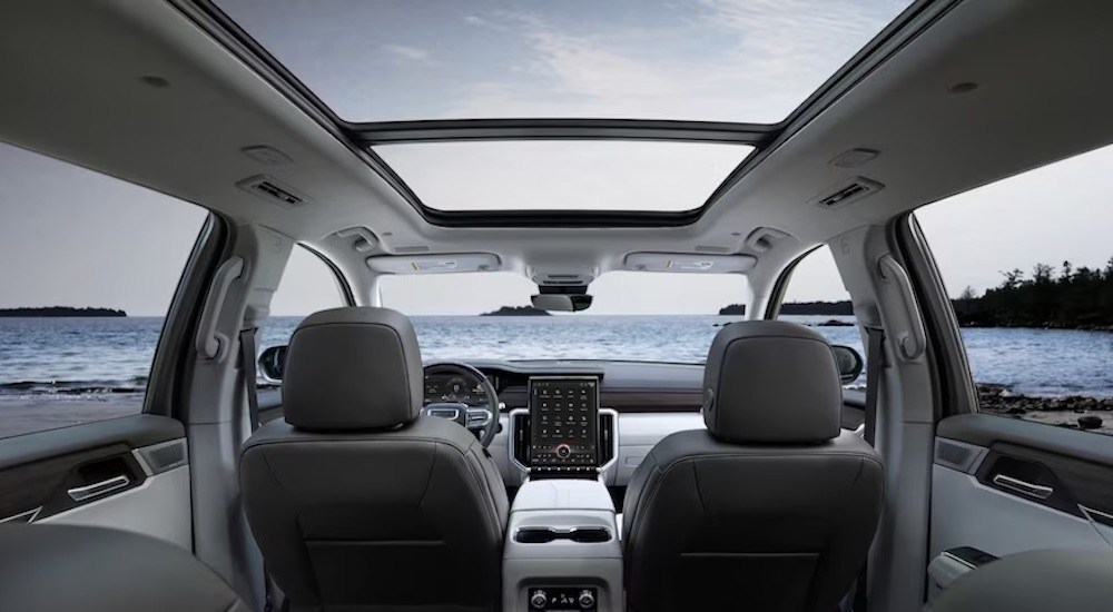 The grey interior of a 2024 GMC Acadia Denali is shown.