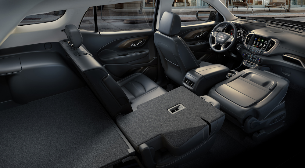 The fold-flat seating in the back of a 2024 GMC Terrain.