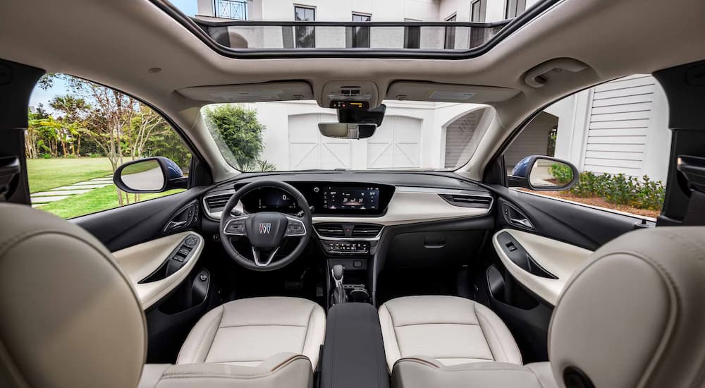 The black and white interior cabin of a 2025 Buick Encore GX.