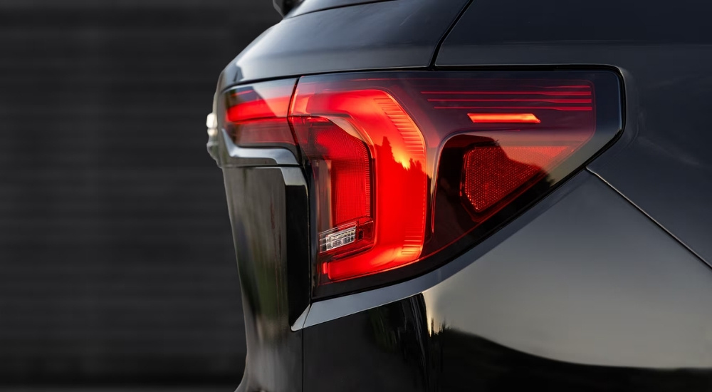 The passenger side taillight is shown on a black 2025 GMC Terrain Elevation.