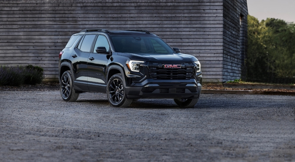 A black 2025 GMC Terrain for sale from the front at an angle.