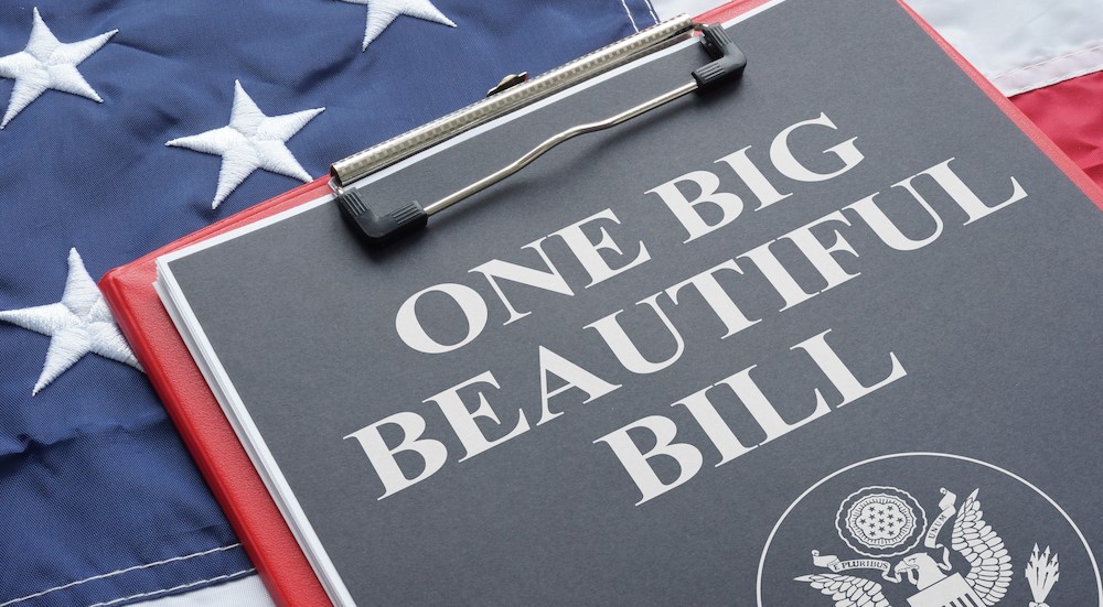 One Big Beautiful Bill on a clipboard.