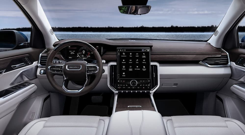 Multi-colored interior and dash in a 2026 GMC Acadia.