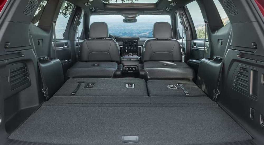 Rear gray cargo area in a 2026 GMC Acadia.