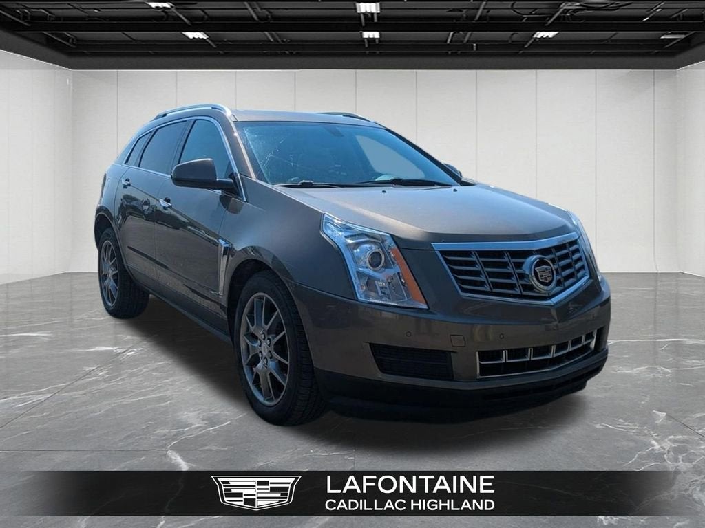 Used 2014 Cadillac SRX Luxury Collection with VIN 3GYFNEE37ES549507 for sale in Highland Charter Township, MI