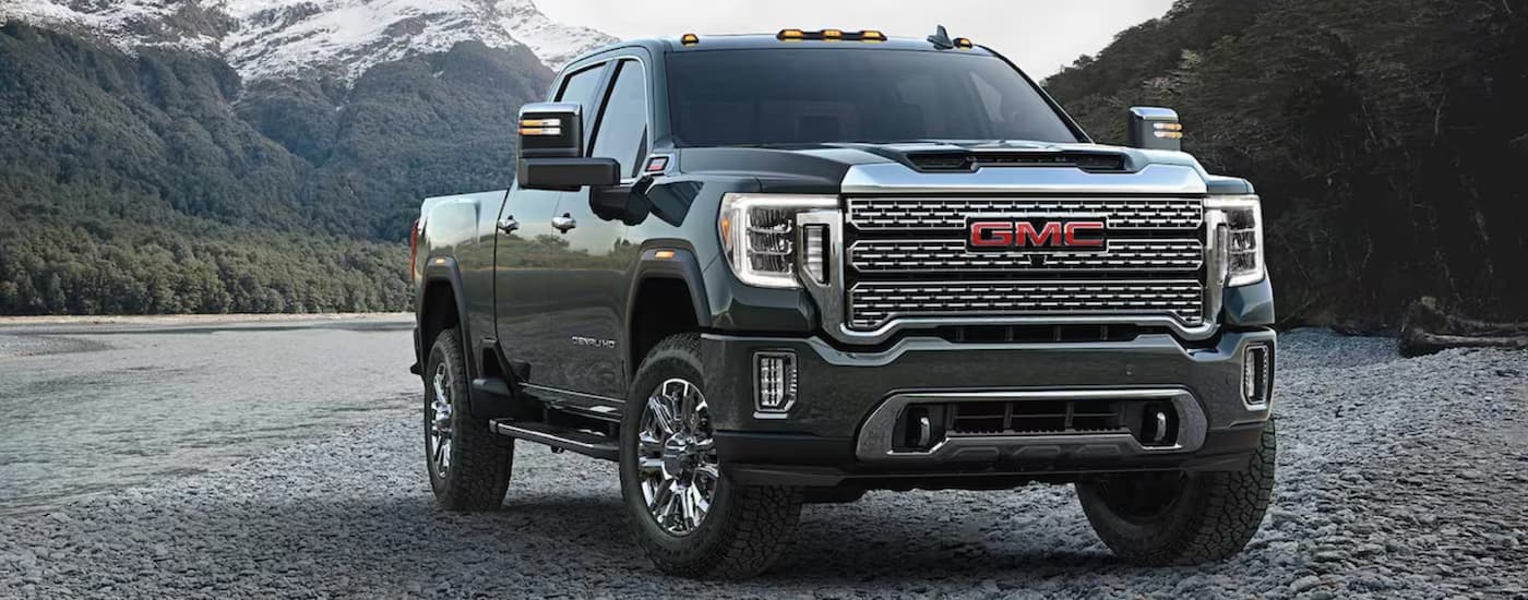 Green 2023 GMC Sierra 2500 HD parked at an angle