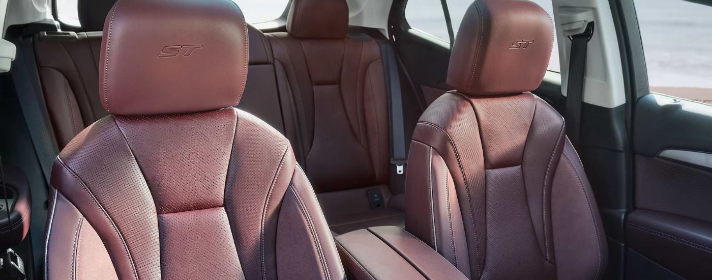 The red leather interior seats on 2026 Buick Envision.
