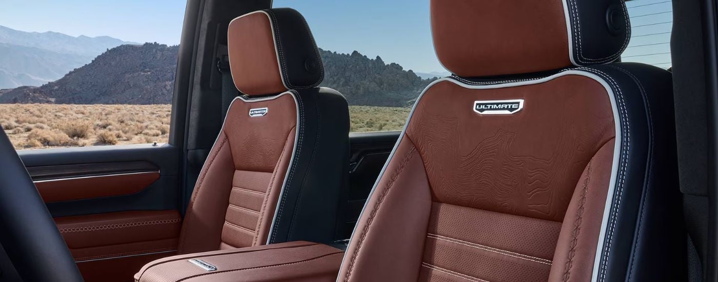 The rust colored leather front seats on a 2026 GMC Sierra 2500.