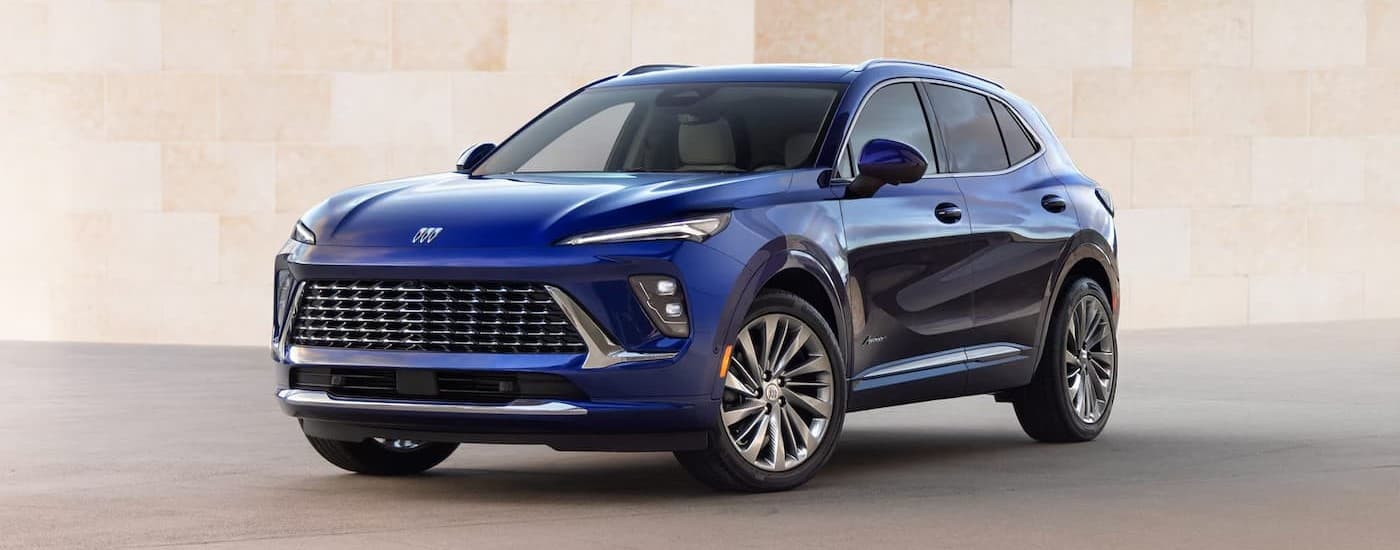 A blue 2025 Buick Envision parked at a Buick dealer near Linden.
